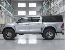 Load image into Gallery viewer, Alu-Cab Explorer Canopy - Hilux Revo 2016+ DC Black Smooth