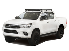 Load image into Gallery viewer, Toyota Hilux Revo DC (2016-Current) Track & Feet Slimline II Roof Rack Kit