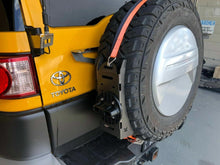 Load image into Gallery viewer, Out-Back Spare Tire Mount With Ratchet Strap by Kaon