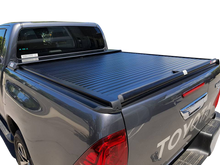 Load image into Gallery viewer, Toyota Hilux Revo Double Cab (2016-Current) Roll Top Load Bed Cover with Side Channels