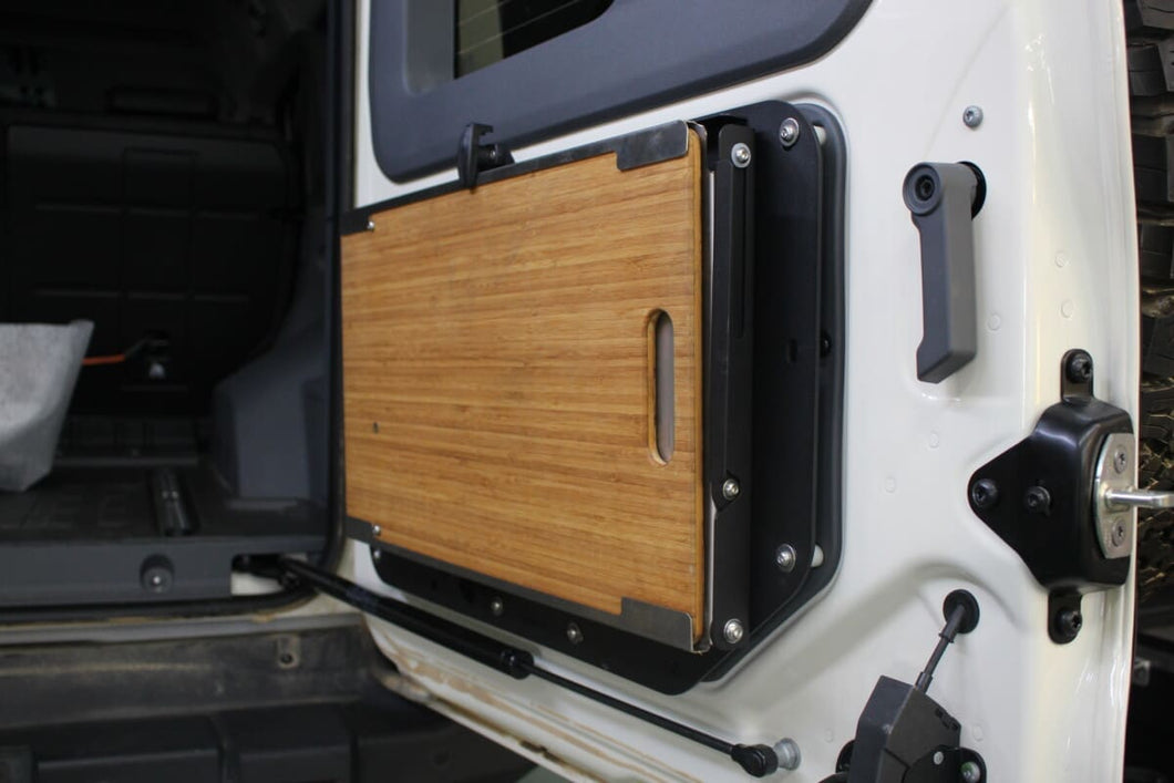 Alu-Cab Rear Door Drop-Down Table for MODCAP