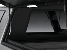 Load image into Gallery viewer, Alu-Cab Explorer Canopy - Hilux Revo 2016+ DC Black Smooth
