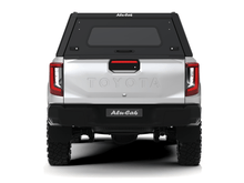 Load image into Gallery viewer, Alu-Cab Explorer Canopy - Hilux Revo 2016+ DC Black Smooth
