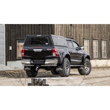 Load image into Gallery viewer, Alu-Cab Explorer Canopy - Hilux Revo 2016+ DC Black Smooth
